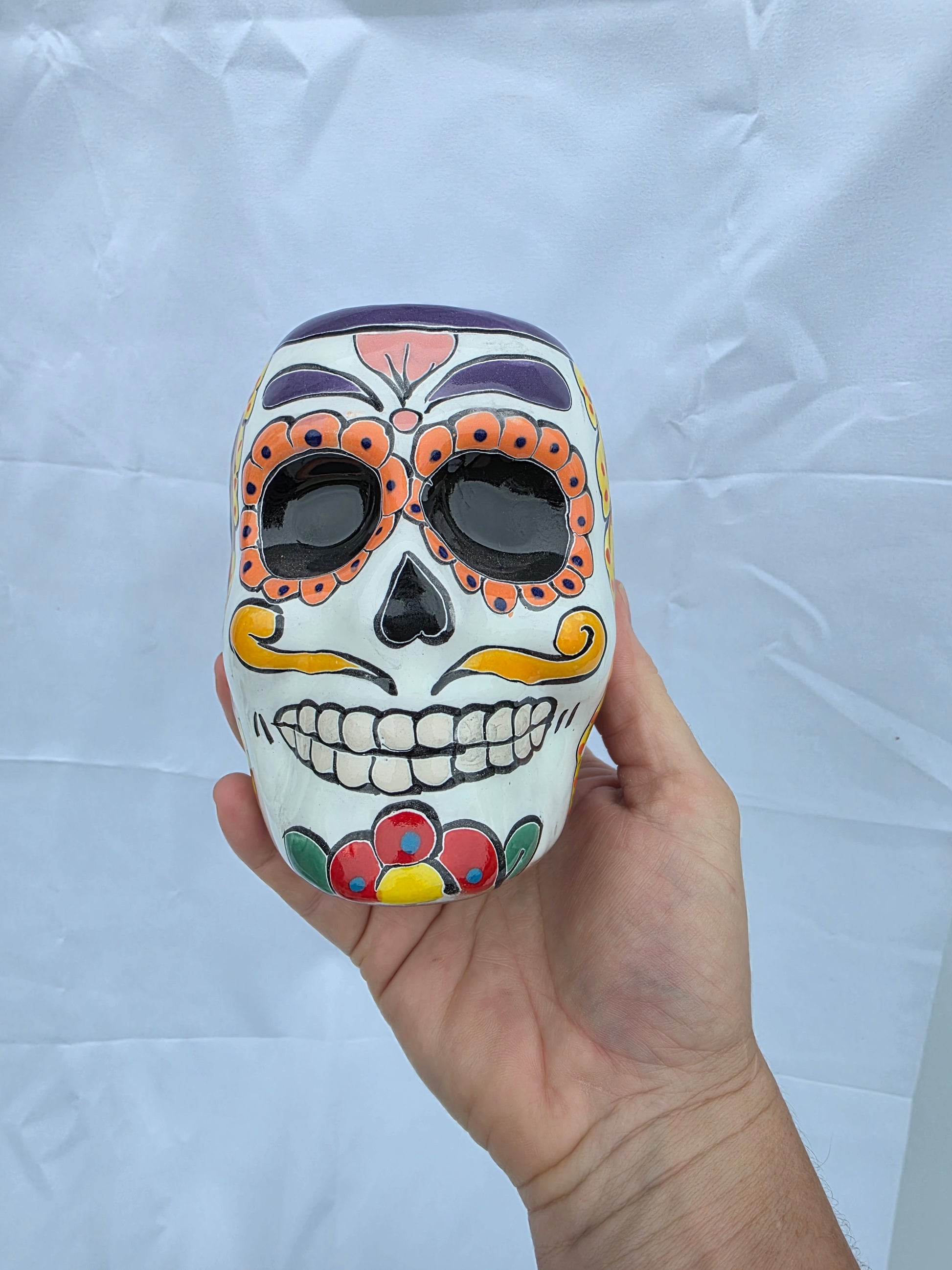 Hand-painted Mexican Talavera sugar skull ceramic planter pot measuring 6 inches tall