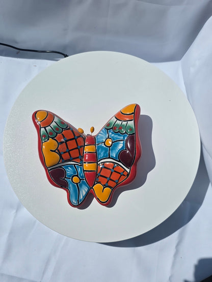 Orange Talavera butterfly wall decor side view, colorful hand-painted ceramic