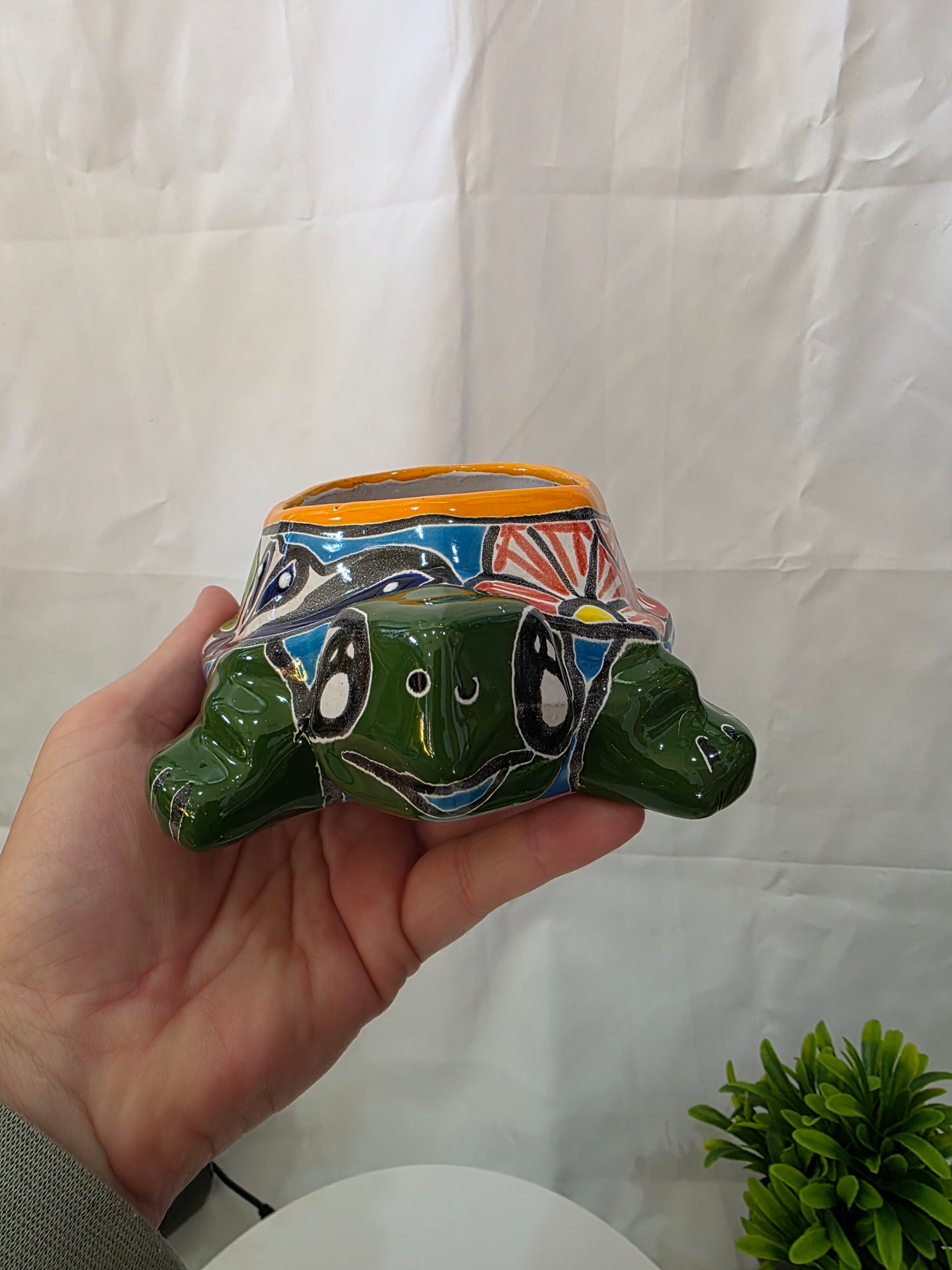 smiling turtle face of green talavera turtle planter
