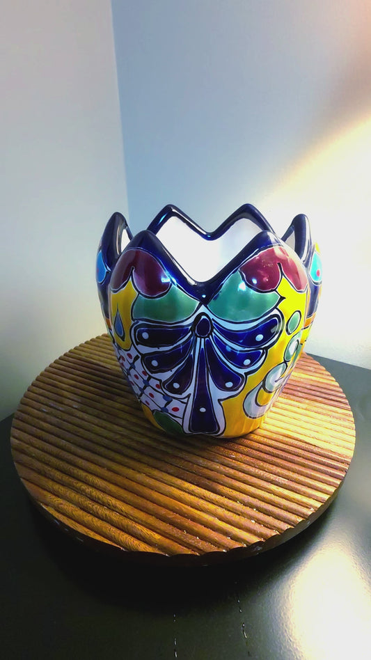 lotus planter on a wood shelf spinning to show all sides, hand painted talavera