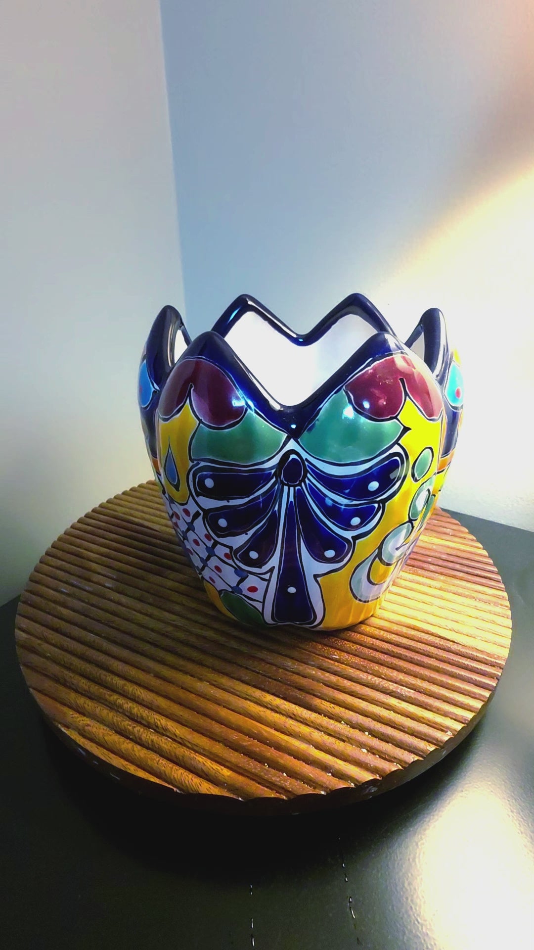 lotus planter on a wood shelf spinning to show all sides, hand painted talavera