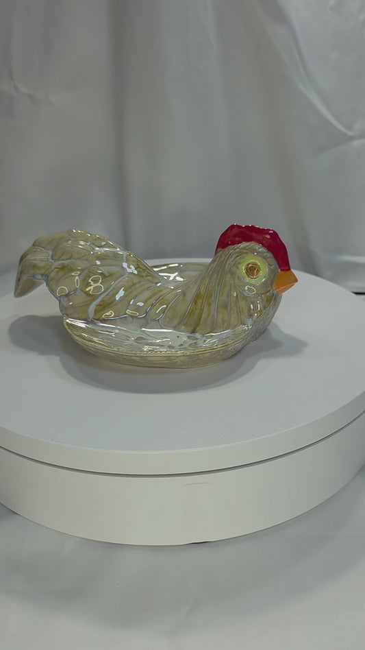 chicken spoon rest on a turntable