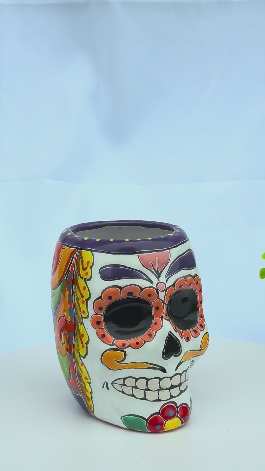 Hand-painted Mexican Talavera sugar skull ceramic planter pot measuring 6 inches tall