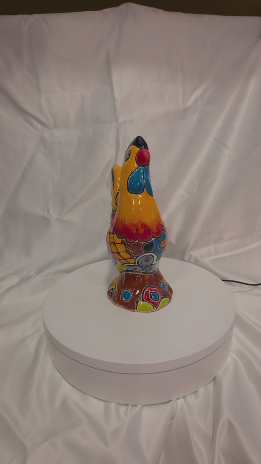 talavera rooster on a turntable