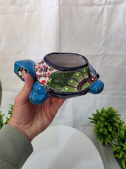 left side view of a turtle planter